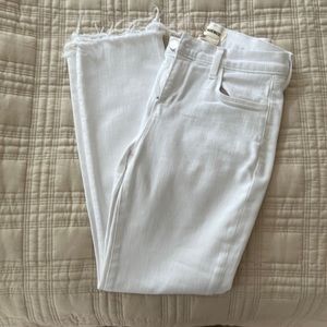 L’Agence white jeans with distressed ankle seams